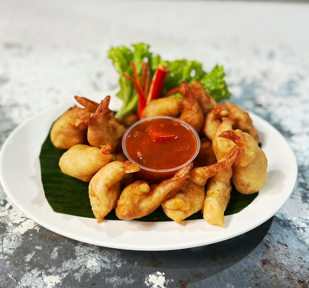 Stock photo of fried shrimp with dipping sauce